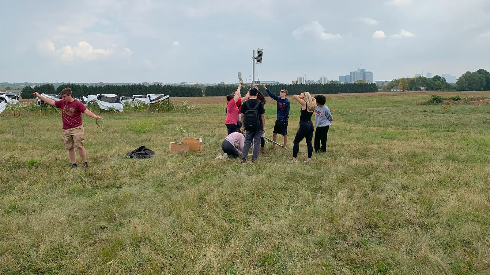 Students in GEOG 5922 working in the field