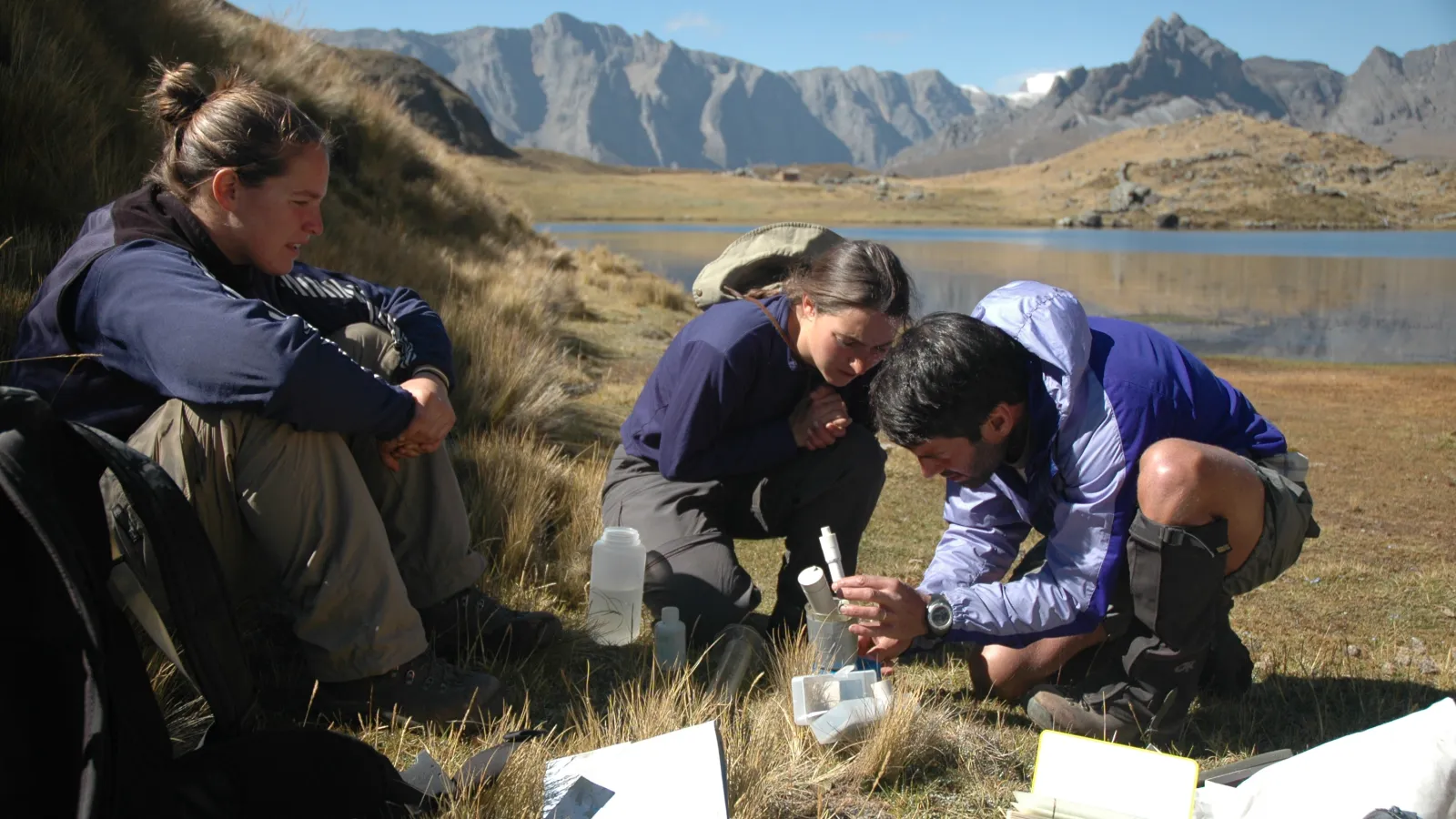 Students collecting water samples for research
