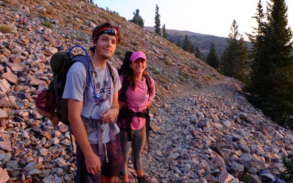 Students backpacking on trail